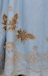 Paulina Embroidered Dress, color_light blue

Close-up of light blue fabric with gold embroidery